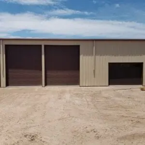 Metal building with garage doors