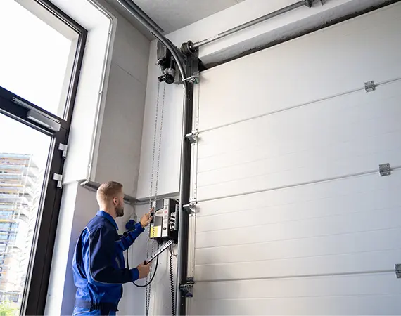 Garage door installation service technician