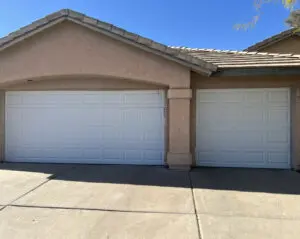 Two modern white garage doors
