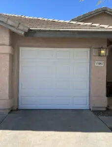 White garage door house exterior