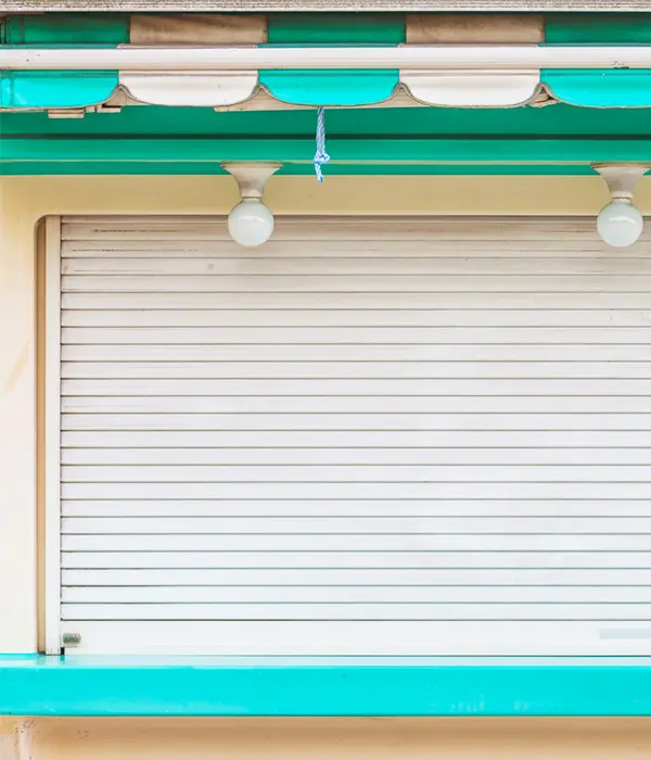 Closed shutter and storefront awning