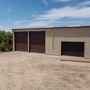Metal building with three garage doors