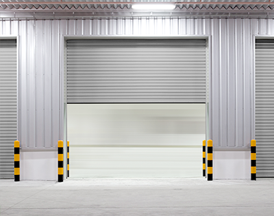 Industrial rolling garage door open