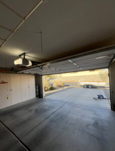 Spacious garage with open door