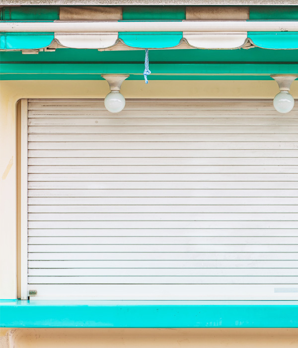 Closed shutter and storefront awning